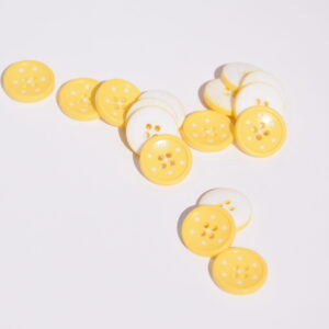 Bouton Rond Plastique Etoiles jaune 15 mm