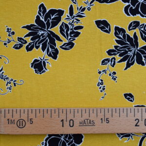 Tissu Jersey de viscose jaune et fleurs noires