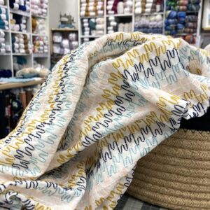Tissu voile de coton brodé zig zag
