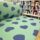 Tissu Sweat Coeurs Vert et Violet