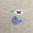 Ecusson Baleine ou Crabe