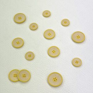 Bouton jaune et beige