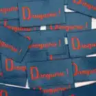 Etiquette à coudre Dinguerie
