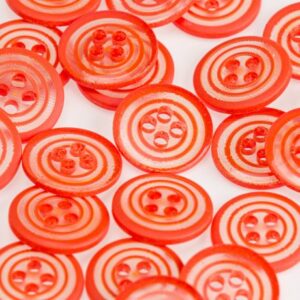 Bouton orange et transparent spirale 15 mm
