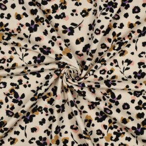 Tissu sweat léopard fleurs