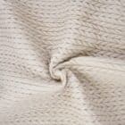 Tissu matelassé imperméable motifs chevrons écru