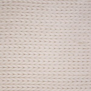 Tissu matelassé imperméable motifs chevrons écru