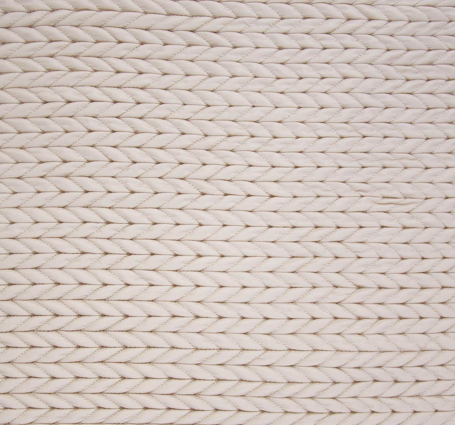 Tissu matelassé imperméable motifs chevrons écru