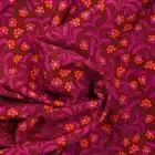 Tissu Viscose Fleurs orange sur fond bordeaux